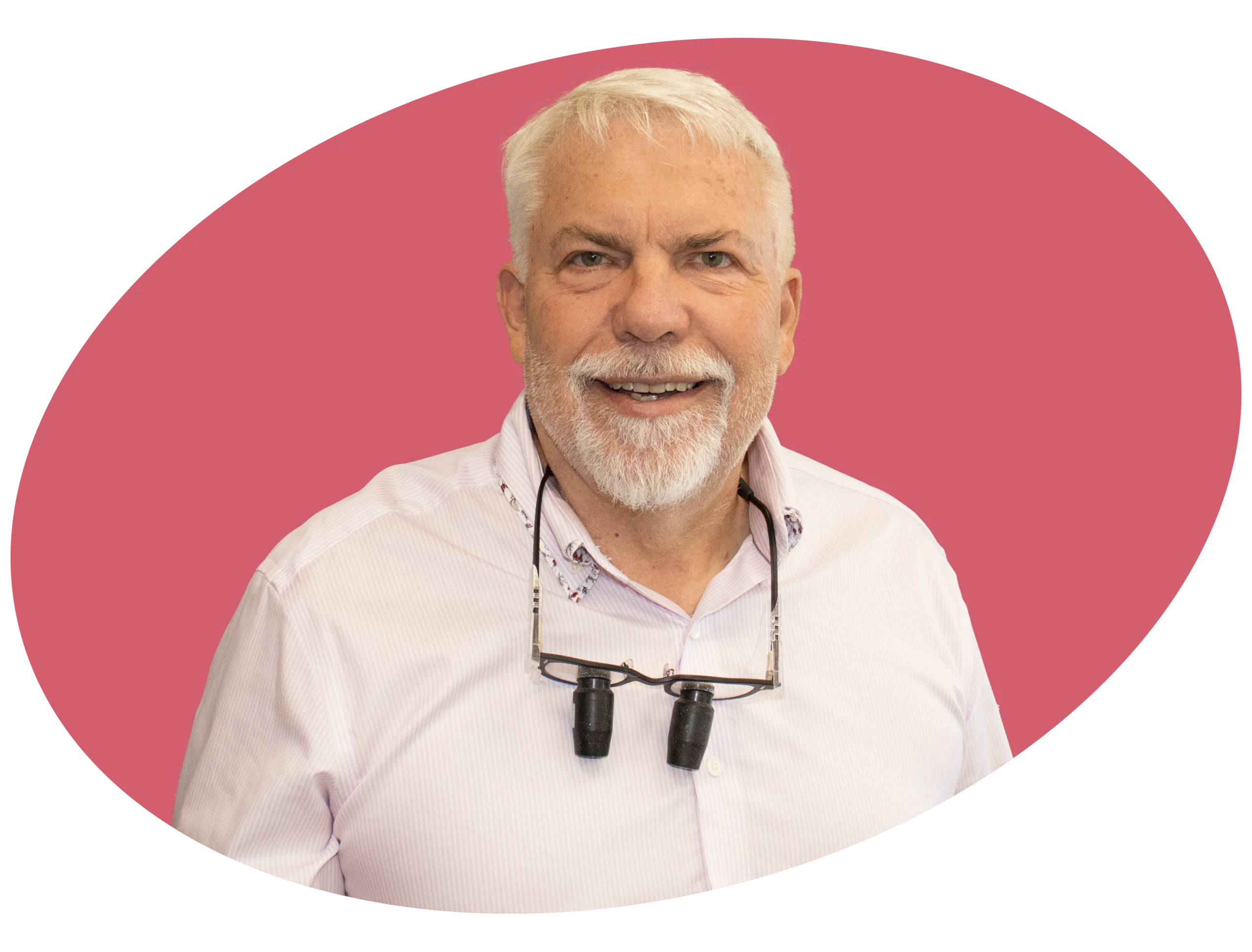 An image of a smiling dentist